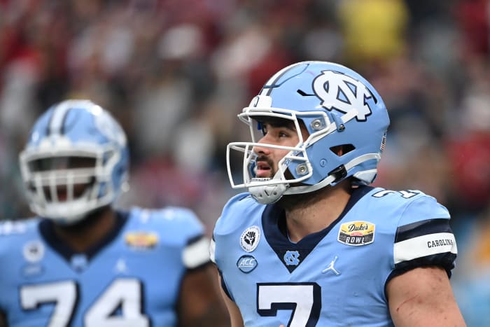 Dec 30, 2021; Charlotte, NC, USA; North Carolina Tar Heels quarterback Sam Howell (7) on the field in the third quarter during the 2021 Duke's Mayo Bowl at Bank of America Stadium. Mandatory Credit: Bob Donnan-USA TODAY Sports